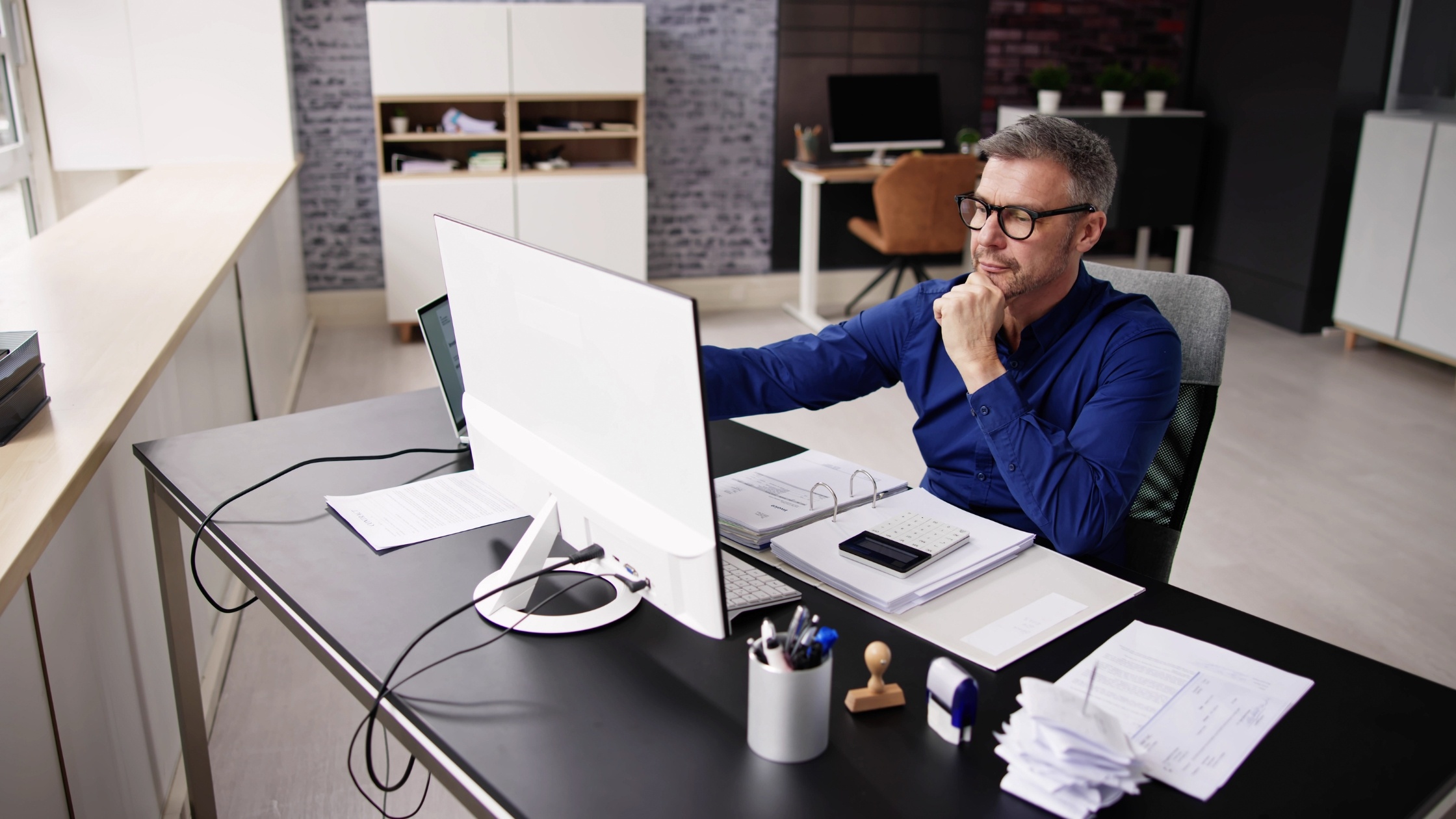 Person at desk doing taxes